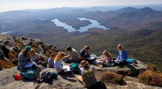 Students and a faculty member on a mountain