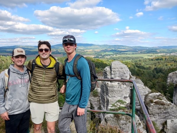Three students on a hike outside of Prague