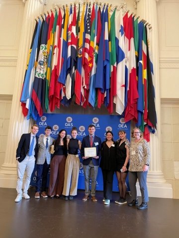 Seven students in the SLU Model OAS Club traveled with Prof. Shelley McConnell to the Organization of American States 