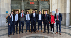 Members of the St. Lawrence Fed Challenge team in front of UBS bank in New York City