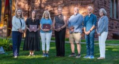 President Morris accompanied by 2026 faculty and staff award winners.