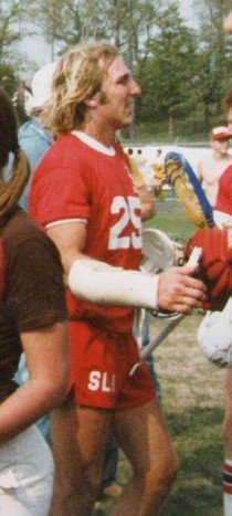 Lacrosse player celebrating win.