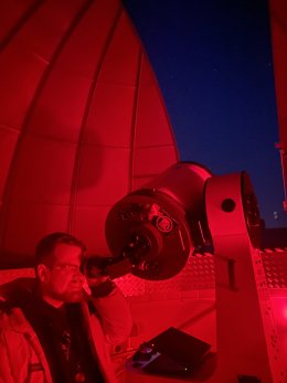 Tyler Karasinski at telescope