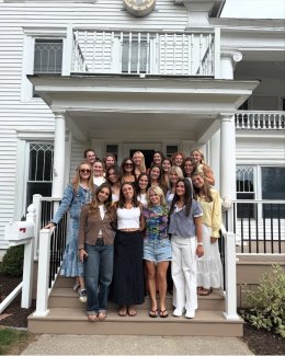 Tri-Delta members on the steps of their house