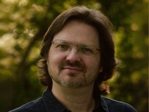 Kenny Cook visits SLU on March 12.