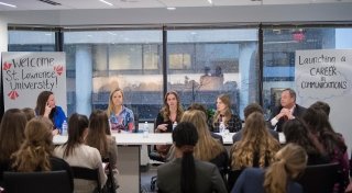 Alumni panel speaking to students