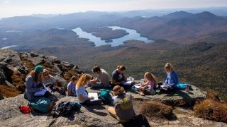 Students and a faculty member on a mountain