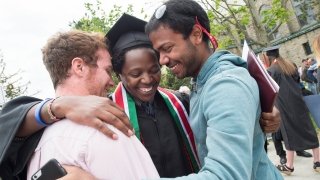 Laurentians embracing at commencement