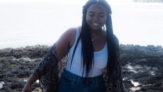Asha Johnson on the beach near her home in Nassau, Bahamas.