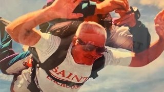Person Skydiving with Saints shirt