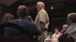 Don Leet speaks to a crowd.