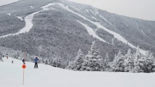 A view overlooking the ski trails on a snow-covered Whiteface Mountain. 