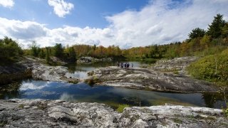 Saint Lawrence students learn in their outdoor geology class in Talcville, New York. 