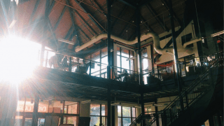 The inside of the Saint Lawrence student center as sun shines through the window. 