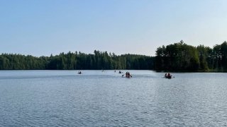 Here they come! Paddling into their semester home on Lake Massawepie