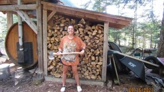 Ryann prepares for a sauna. All of our wood comes from Massawepie property.