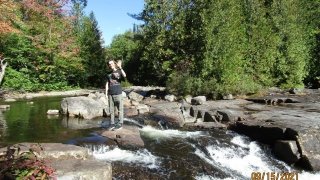The cold waters of the Hudson rush past as John waves hello.