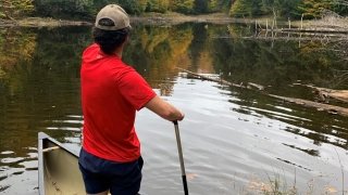 Having successfully navigated their way, Kai points out at Lost Pond.