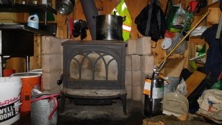 The best wood stove in Arcadia: the kitchen stove with soon-to-be-burned firewood.