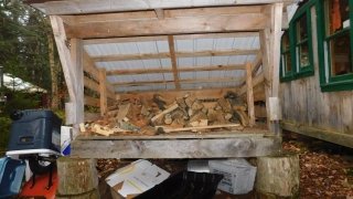 Wood shack designated for kitchen wood stove.