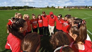 Cross Country team in a circle