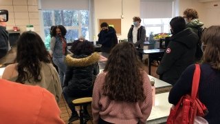 Artist Chloe Alexander welcomes some guests to the studio