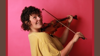 Danica Cunningham '13 plays the fiddle
