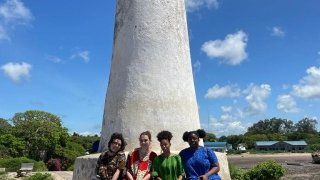 Students in Front of Statue