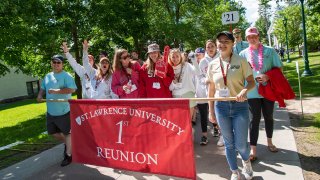 Alumni from the Class of 2021 walk in the Reunion Parade