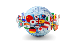 A blue globe is surrounded by flags from various countries.