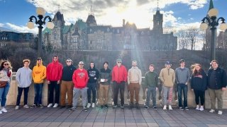 Canadian Studies Ottawa Field Trip. Students and Prof. Jockel with Parliament background