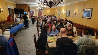 Group photo and dinner table