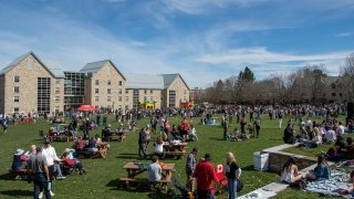The over one thousand people on the Richard F Brush University Quad on a sunny day in preparation of the total solar eclipse.