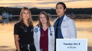 two female and one male Dr. posing for picture