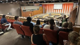 A general view of the United Nations Economic and Social Council Hall where students are being briefed by UN personnel