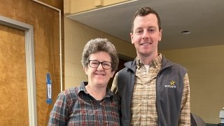 woman and man smiling for picture