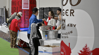 Emily Tulip Droppa '09 and Jack Droppa '11 of Weird Window Brewing served up signature brews Scarlet and Brown Ale and 1856 Lager for Reunion Weekend.