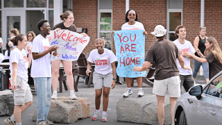Saint Lawrence University Orientation Leaders welcoming students to their new home on move-in day