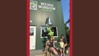 Emily, Alice, and Jack Droppa outside of their brewery, Weird Window Brewing.