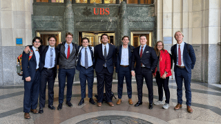 Members of the St. Lawrence Fed Challenge team in front of UBS bank in New York City