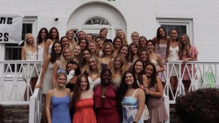 Kappa members on front steps of their house