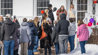 Emma Gatcliffe '27 being ceremoniously "sent off" to the 2026 Milan Cortina Winter Olympics by St. Lawrence faculty, staff, teammates, and friends