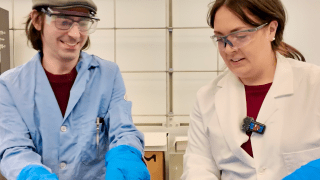 Assistant Professor of Chemistry Patrick Lutz and Lauren Jesmaine '26 conducting an experiment that submerges sprinkles in liquid nitrogen