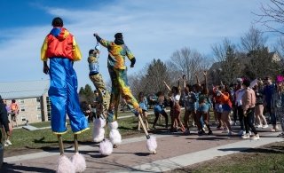 People walking on stilts