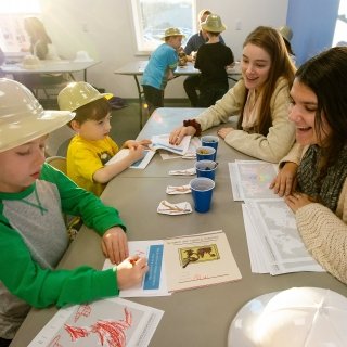 St. Lawrence students working with local children