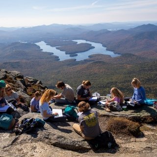 Students and a faculty member on a mountain