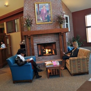 People sitting in the waiting room of the health center
