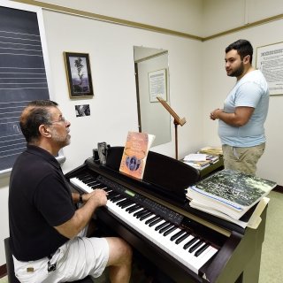 Teacher and student in practice room