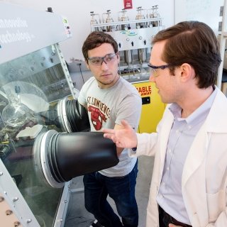 Faculty member and student conducting research