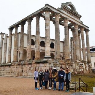 Students in front of ancient ruins